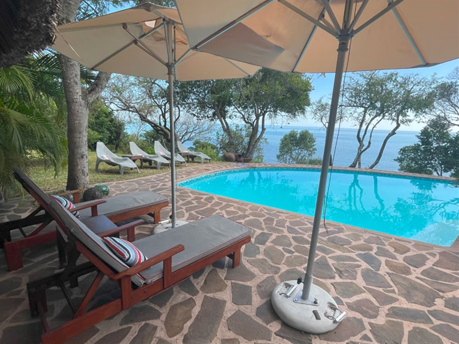 Pool with Umbrellas and Chairs