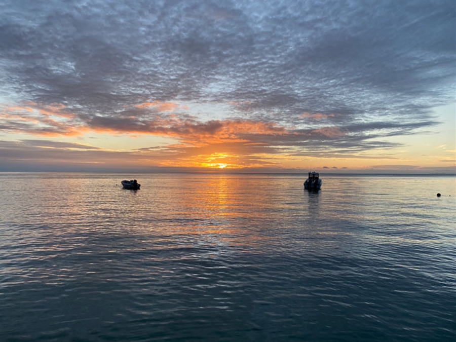 Sunset with two boats